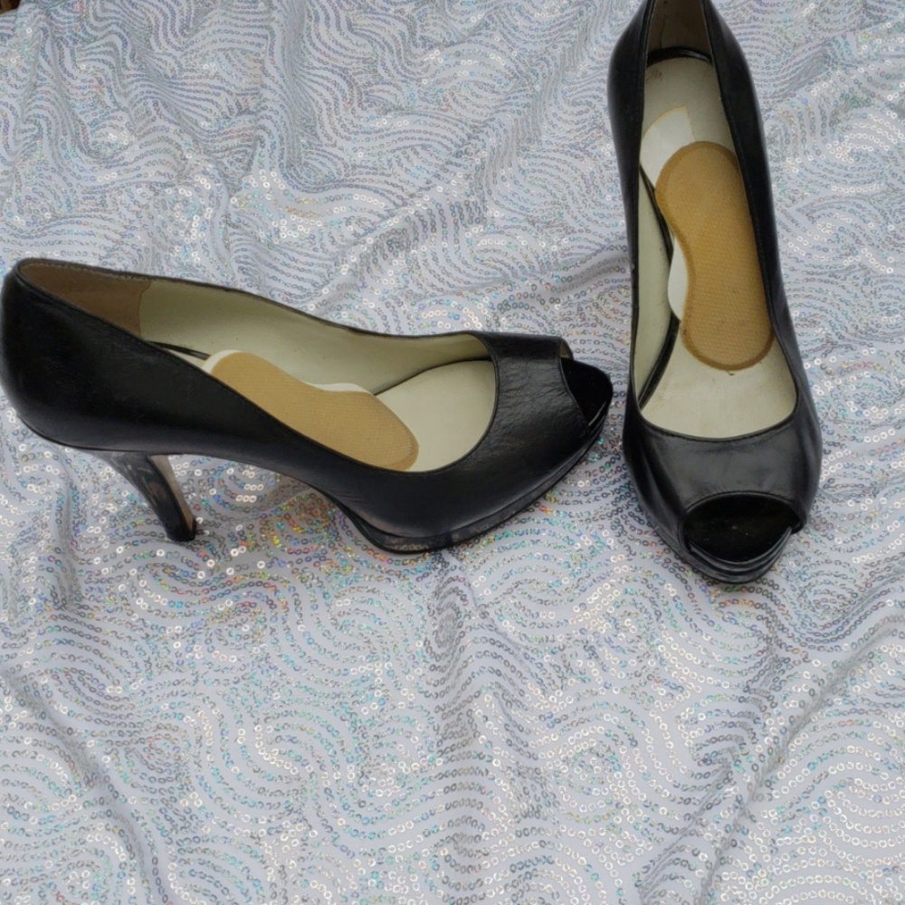 Black leather open toe pumps
